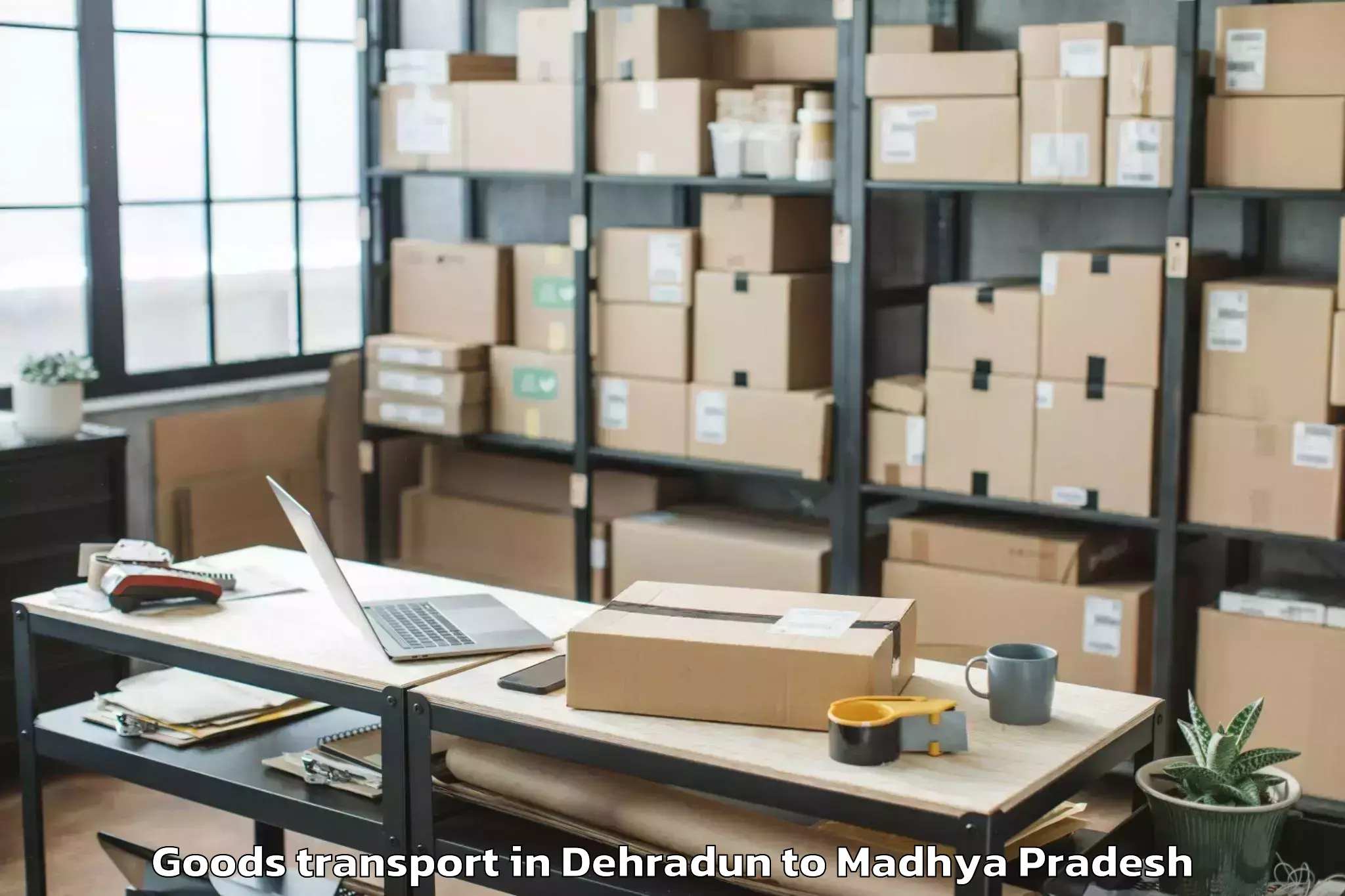 Quality Dehradun to Gautampura Goods Transport